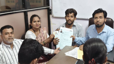Documentation awareness camp in Mukund Nagar helping residents with Aadhaar and PAN cards